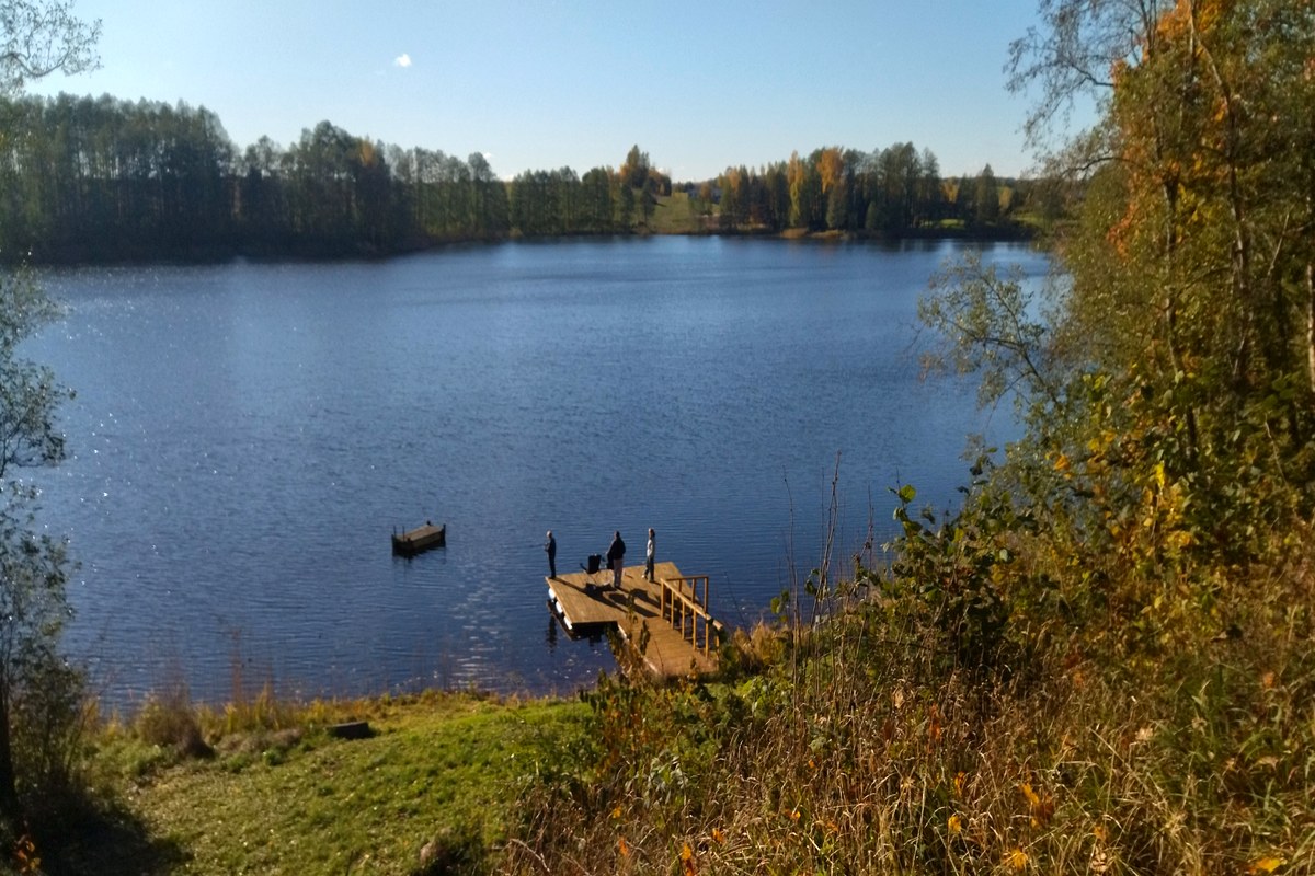 Lithuanian countryside lake and dock in autumn